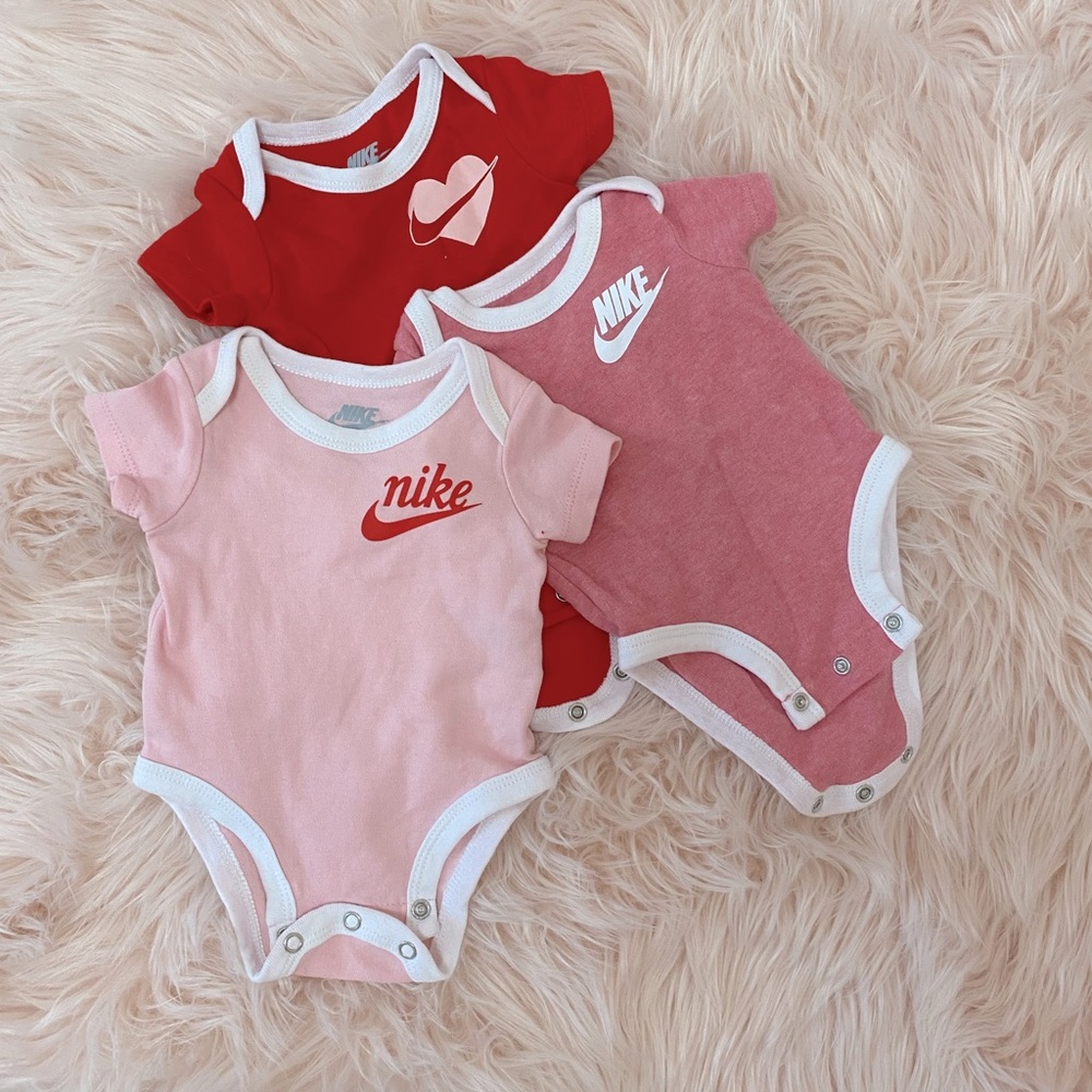 Set of three girls Nike onesies 0-3 months